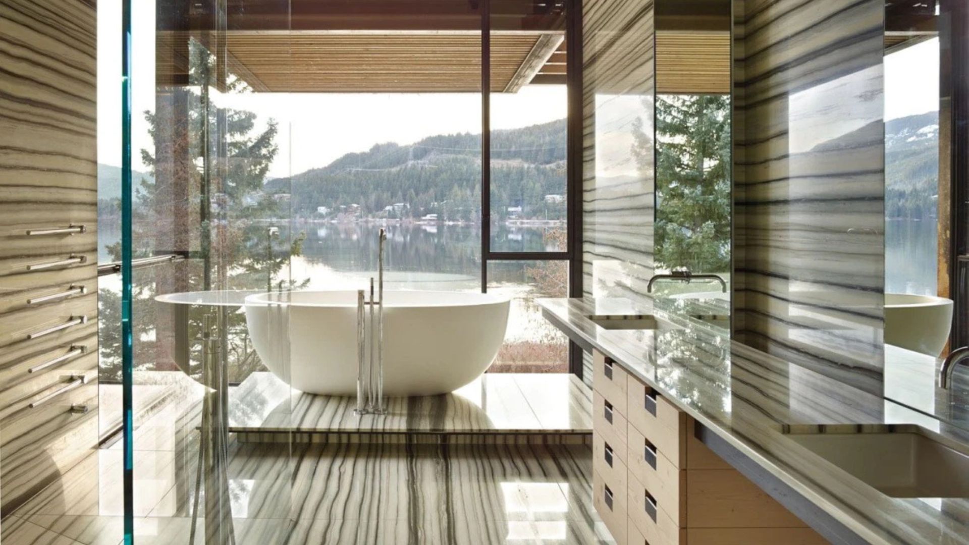 1-olson-kundig-modern-lake-house-bathroom-linear-veined-stone-freestanding-bath