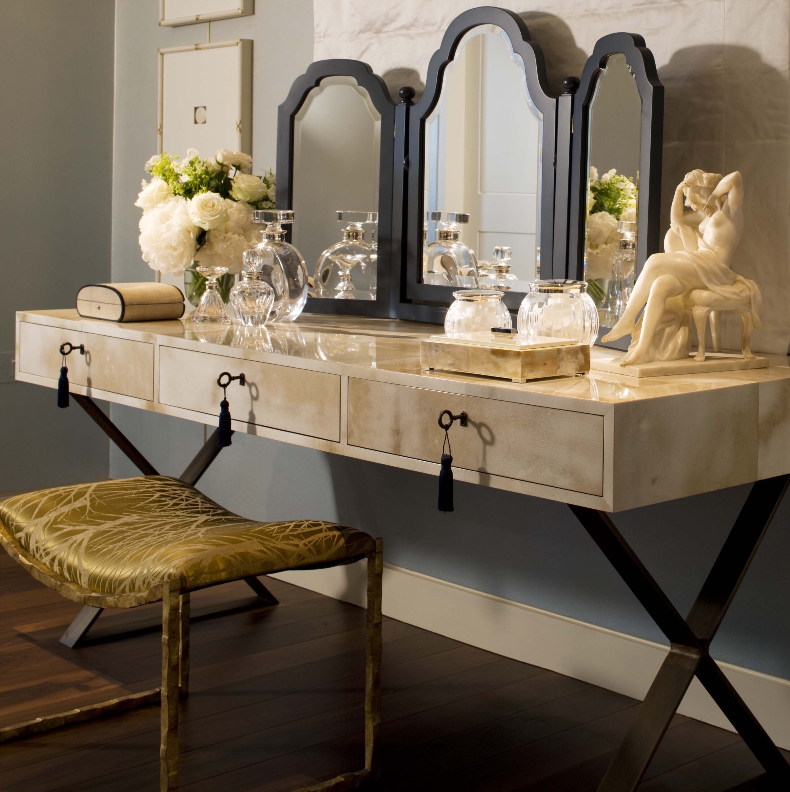 black-folding-mirror-vanity-table-glass-perfume-bottles-floral-arrangement-drawer-tassel-handles- 01