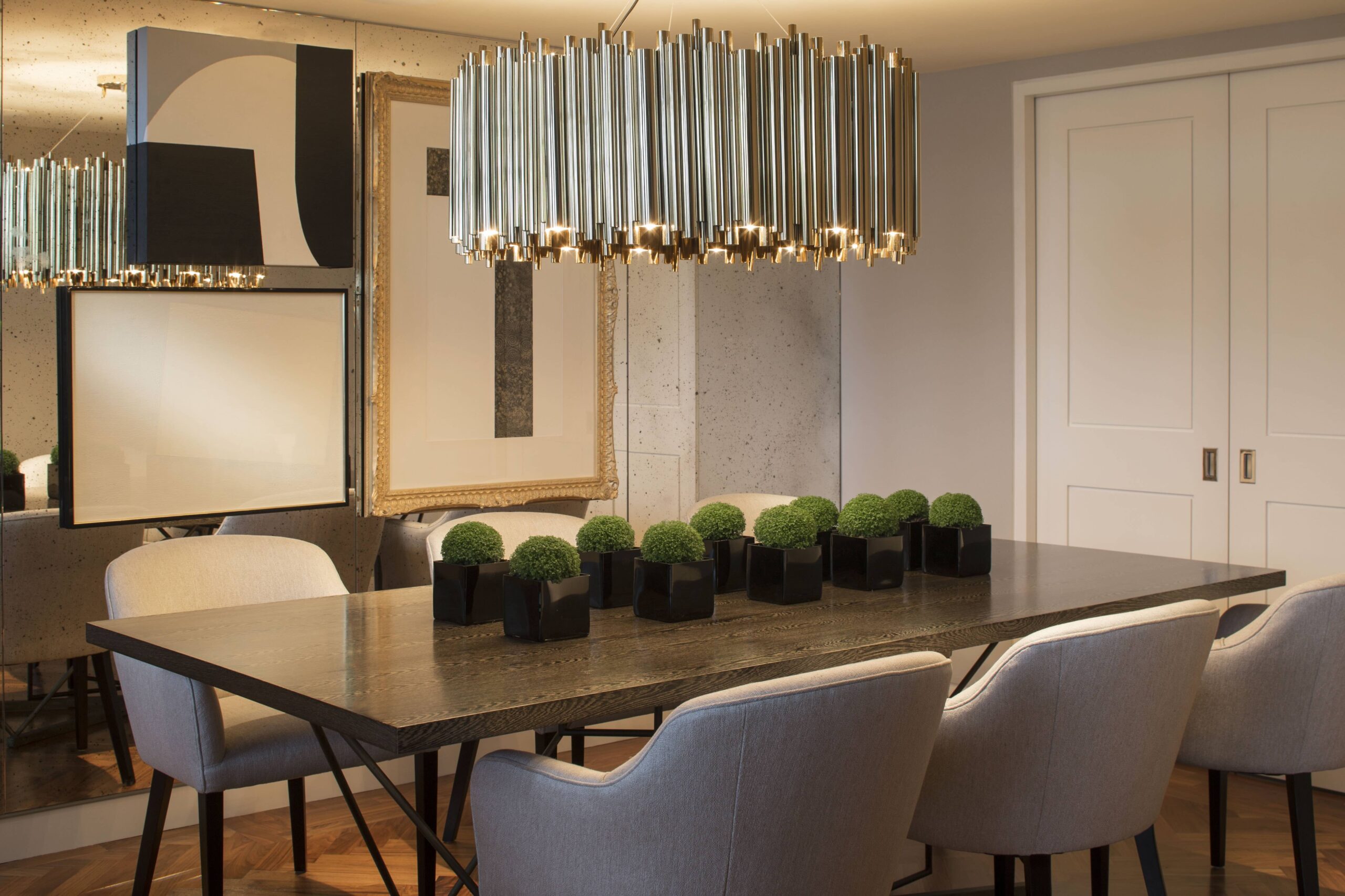 dining-room-long-table-upholstered-chairs-linear-metal-chandelier 08