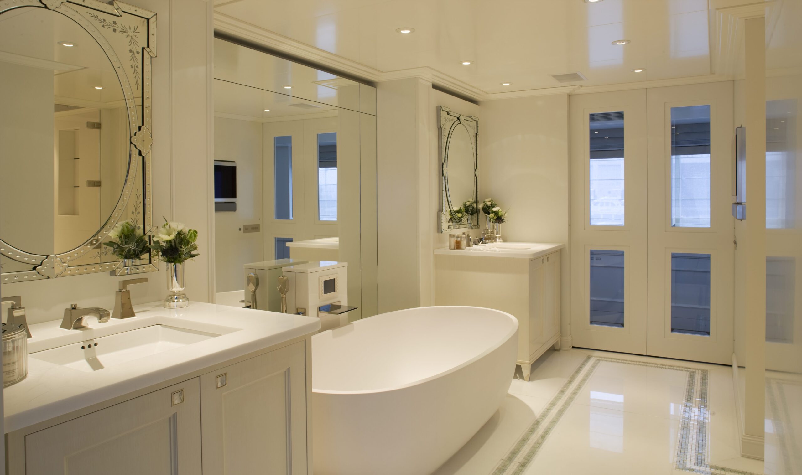 freestanding-bathtub-double-vanity-mirrored-wall-bathroom 04