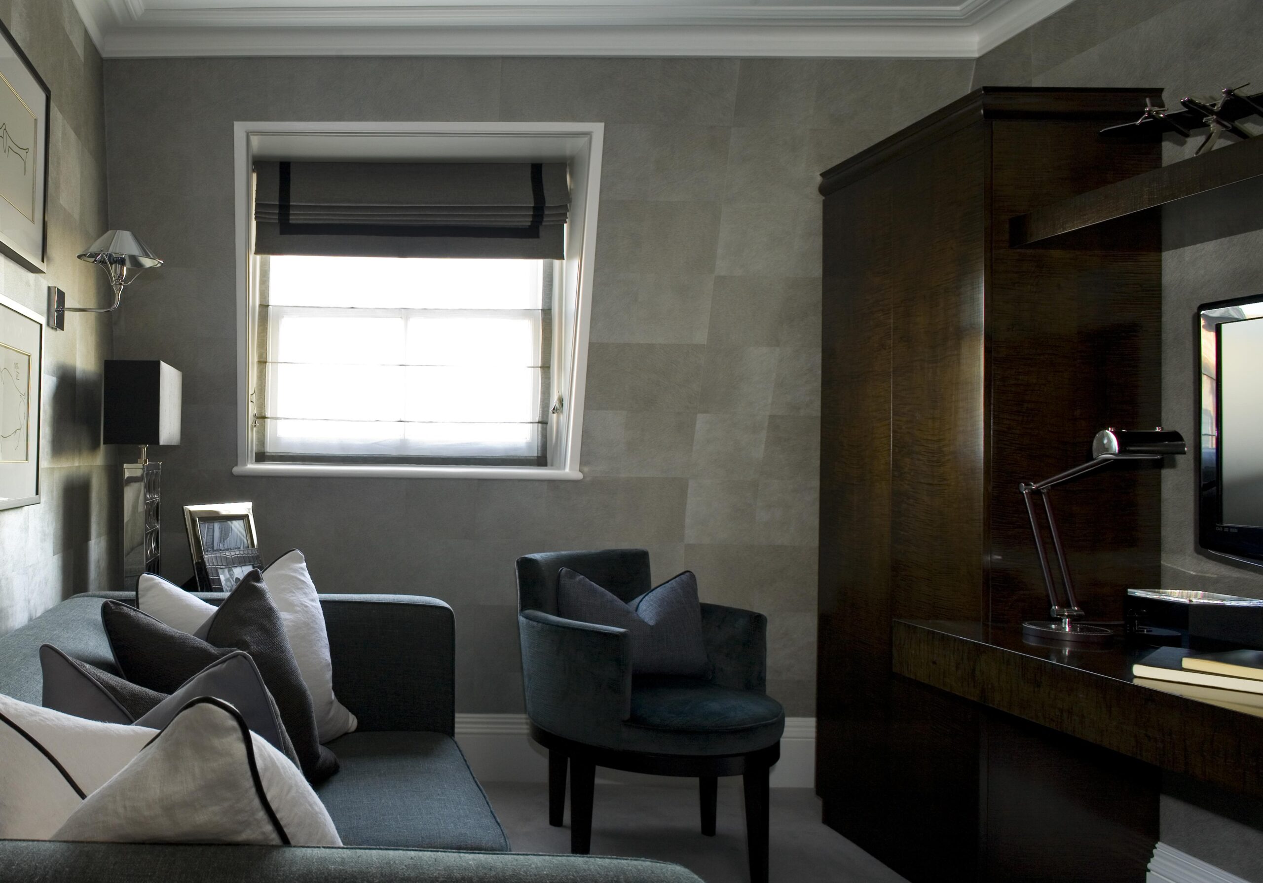 grey-sofa-armchair-window-roman-blind-wood-cabinet-desk-lamp-home-office 04