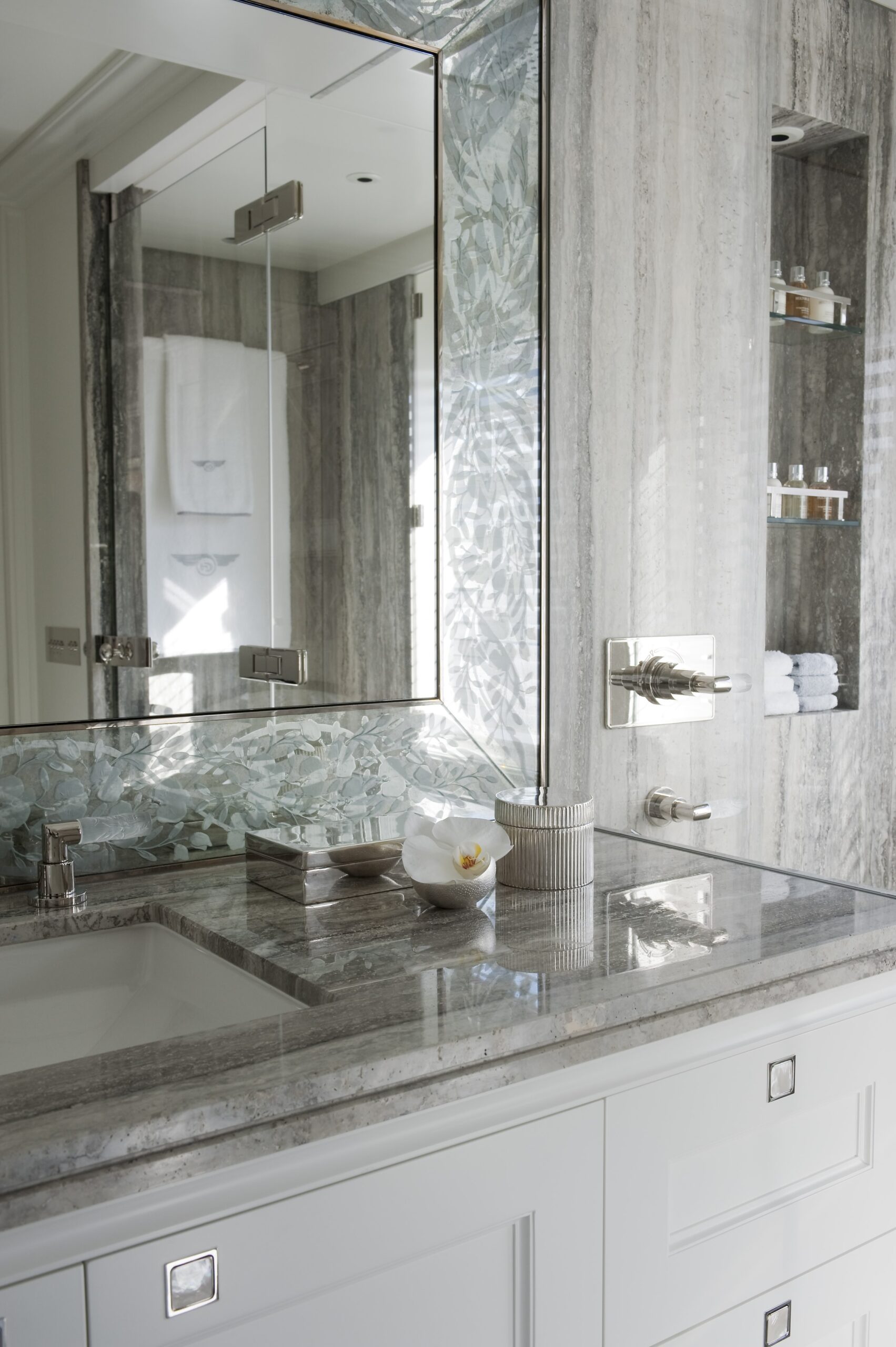 mirrored-wall-bathroom-vanity-stone-countertop-glass-shelves 03