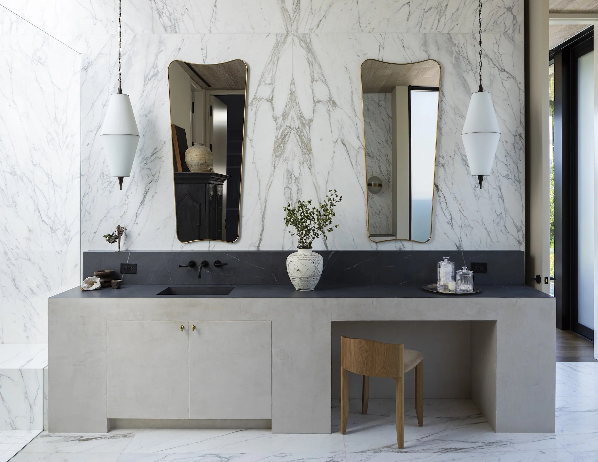 nate-berkus-minimal-marble-bathroom-floor-to-ceiling-stone-floating-vanity