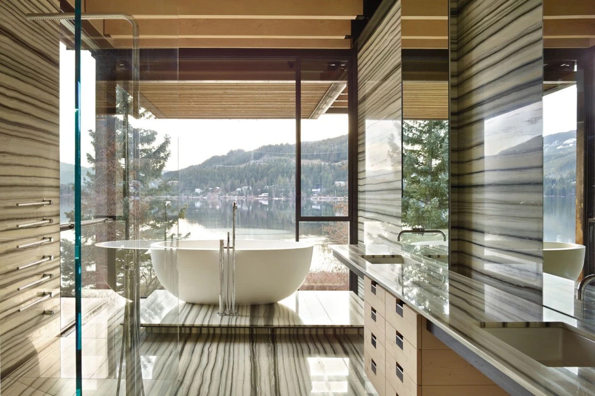 olson-kundig-modern-lake-house-bathroom-linear-veined-stone-freestanding-bath